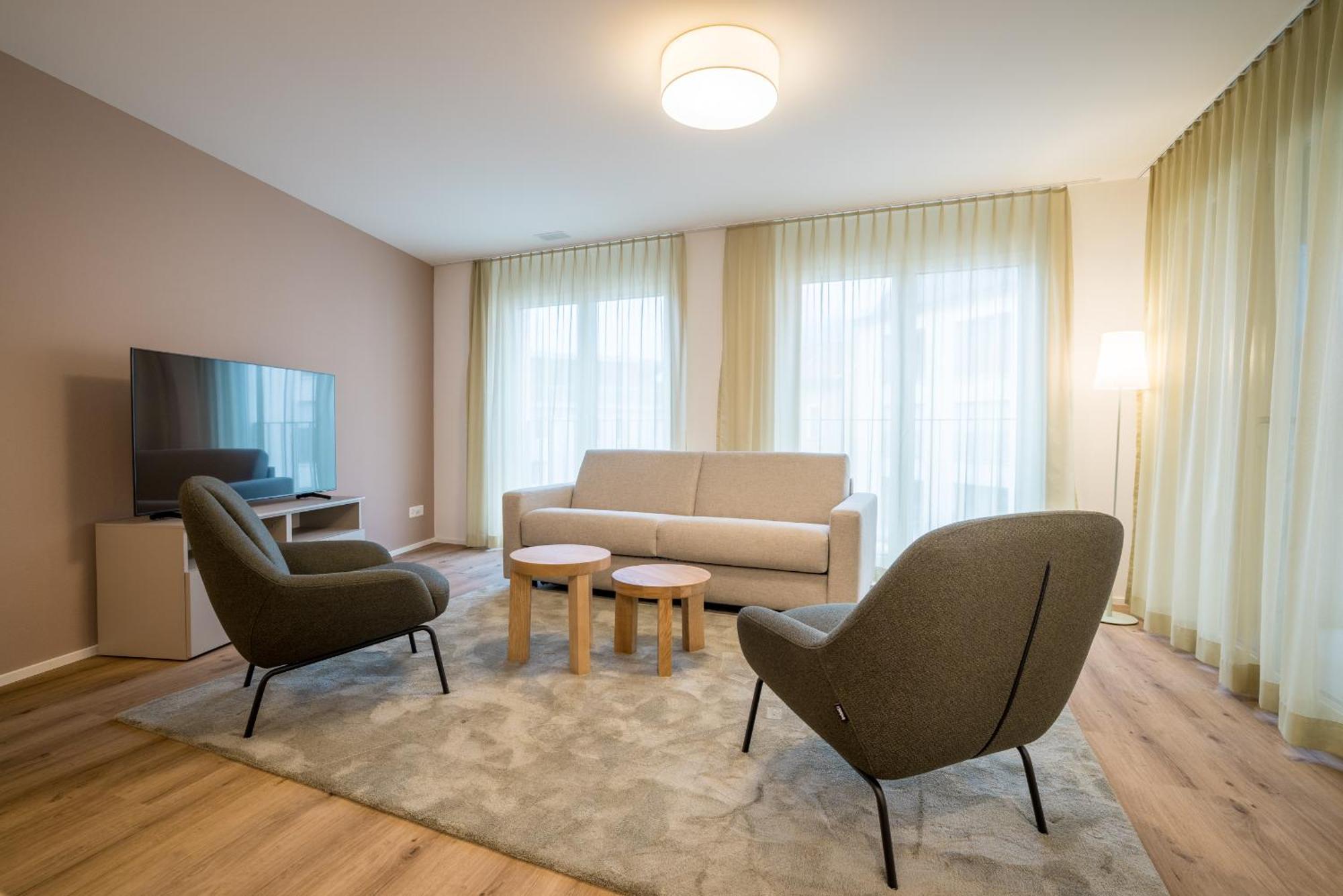 Modern City Apartments อินเทอร์ลาเคน ห้อง รูปภาพ